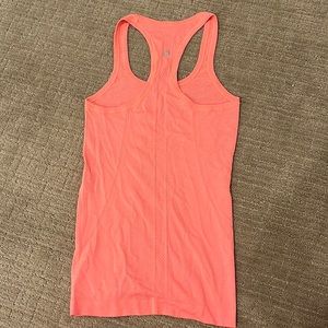 Coral colored Lulu lemon athletic tank top